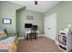 Bedroom featuring neutral walls, a ceiling fan, and lots of natural light at 5130 Pratt Sw St, Covington, GA 30014