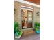 Inviting front entrance with double doors and potted plants at 5130 Pratt Sw St, Covington, GA 30014