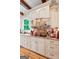 Kitchen with custom cabinets, tile backsplash and stone countertops at 5130 Pratt Sw St, Covington, GA 30014