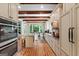 Spacious kitchen with wooden floors and stone countertops at 5130 Pratt Sw St, Covington, GA 30014