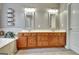 Bathroom featuring double vanities with cabinetry and a soaking tub at 260 Bonnie Ln, Fayetteville, GA 30215