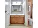 Bathroom featuring a wood vanity, white countertops, and tile flooring at 260 Bonnie Ln, Fayetteville, GA 30215