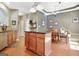 Open kitchen with stainless steel appliances, wood cabinets, and eat in area at 260 Bonnie Ln, Fayetteville, GA 30215