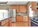 Spacious kitchen featuring stainless steel appliances and light wood cabinets at 260 Bonnie Ln, Fayetteville, GA 30215