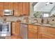 Kitchen featuring stainless steel appliances, granite countertops, and breakfast bar at 260 Bonnie Ln, Fayetteville, GA 30215
