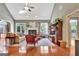 Spacious living room with hardwood floors, fireplace, and bright windows showcasing an inviting atmosphere at 260 Bonnie Ln, Fayetteville, GA 30215