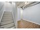 View of basement stairs leading to an additional room at 7505 Brookwood Way, Cumming, GA 30041