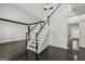 Beautiful staircase with dark hardwood floors and plenty of natural light at 7505 Brookwood Way, Cumming, GA 30041