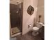 Bathroom with shower, toilet and tiled floors at 522 Blue Mountain Rise, Canton, GA 30114
