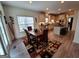Bright dining area with window view and seamless access to the open kitchen and living space at 522 Blue Mountain Rise, Canton, GA 30114