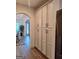 Hallway featuring built-in storage and seamless access to the living spaces at 522 Blue Mountain Rise, Canton, GA 30114