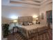 Relaxing main bedroom with neutral tones, tray ceiling, and large windows for natural light at 522 Blue Mountain Rise, Canton, GA 30114
