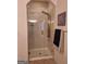 Modern shower with golden fixtures and tiled walls at 522 Blue Mountain Rise, Canton, GA 30114