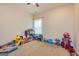 Bright bedroom with carpeted floors and large window at 40 Westbrook Rd, Carrollton, GA 30116