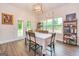 Inviting dining room with lots of natural light and stylish furniture at 40 Westbrook Rd, Carrollton, GA 30116