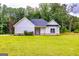 Charming single-story home with a well-manicured lawn and inviting entryway at 40 Westbrook Rd, Carrollton, GA 30116