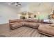 Spacious living room with a large sectional couch and hardwood floors at 40 Westbrook Rd, Carrollton, GA 30116