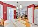 Dining area leads into the living room, offering an open-concept living space at 52 Cherub Ln, Sharpsburg, GA 30277