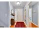 Welcoming foyer boasts hardwood floors, elegant decor, and ample natural light at 52 Cherub Ln, Sharpsburg, GA 30277