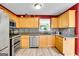 Bright kitchen featuring stainless steel appliances, granite countertops and mosaic backsplash at 52 Cherub Ln, Sharpsburg, GA 30277
