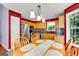Cozy eat-in kitchen featuring stainless steel appliances and warm, wood-tone cabinetry at 52 Cherub Ln, Sharpsburg, GA 30277