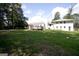 Large backyard features a wooden deck and a well-manicured lawn at 3686 Calmer Cir, East Point, GA 30344