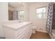 Bathroom with new vanity and a shower/tub combo at 3686 Calmer Cir, East Point, GA 30344