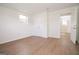 Bright room with vinyl floors, closet, and doorway to another room, offering flexible space at 3686 Calmer Cir, East Point, GA 30344