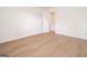 Spacious room with vinyl flooring and an open doorway leading to another room at 3686 Calmer Cir, East Point, GA 30344
