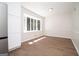 Sunlit dining room with chair rail detail and large windows at 3686 Calmer Cir, East Point, GA 30344