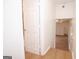 Hallway featuring hardwood flooring and access to the rest of the home at 3686 Calmer Cir, East Point, GA 30344