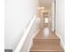 Upstairs hallway with a peek into one of the bedrooms at 3686 Calmer Cir, East Point, GA 30344