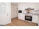 Modern kitchen showcases white cabinets, granite countertops, and stainless steel appliances at 3686 Calmer Cir, East Point, GA 30344