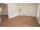 Bright living room boasts hardwood floors and a neutral palette, creating a welcoming atmosphere at 3686 Calmer Cir, East Point, GA 30344