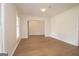 Spacious living room featuring hardwood floors, neutral walls, and natural light at 3686 Calmer Cir, East Point, GA 30344