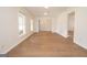 Spacious living room featuring hardwood floors and neutral paint, creating an open and airy feel at 3686 Calmer Cir, East Point, GA 30344