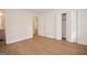 Spacious bedroom featuring hardwood flooring, a walk-in closet, and neutral color scheme at 3686 Calmer Cir, East Point, GA 30344