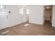 Bright room with white trim and vinyl floors with two entries allowing easy access to adjacent rooms at 3686 Calmer Cir, East Point, GA 30344
