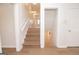 Modern staircase leading to the upper level of the home at 3686 Calmer Cir, East Point, GA 30344