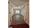 Large bedroom with tray ceiling, hardwood floors, and bright lighting at 375 Sapphire Bnd, Riverdale, GA 30296
