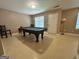 Spacious recreational room with a billiard table, natural light, and neutral paint at 375 Sapphire Bnd, Riverdale, GA 30296