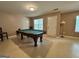 Game room with billiard table, linoleum flooring, neutral color, and natural light at 375 Sapphire Bnd, Riverdale, GA 30296