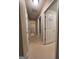 Hallway leading to a laundry room and bathroom at 375 Sapphire Bnd, Riverdale, GA 30296