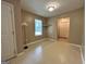 Living room with neutral walls, linoleum flooring, and large window for plenty of natural light at 375 Sapphire Bnd, Riverdale, GA 30296