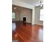 Living room with a fireplace and hardwood floors offers a cozy and inviting atmosphere at 375 Sapphire Bnd, Riverdale, GA 30296