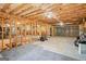 Spacious unfinished basement with exposed ceiling, perfect for storage and/or converting into a recreational area at 1010 Capella Creek Way, Grayson, GA 30017