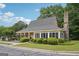 Attractive clubhouse with expansive windows and mature landscaping, perfect for gatherings at 1010 Capella Creek Way, Grayson, GA 30017