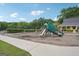 Bright and cheerful community playground with seating area and mature shade trees at 1010 Capella Creek Way, Grayson, GA 30017