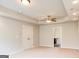 Versatile bonus room with neutral carpet, recessed lighting, and access to an en-suite bathroom at 8109 Nolan Trl, Snellville, GA 30039