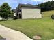 Exterior of the property showcasing a well-maintained lawn, siding, and landscaping, enhancing its curb appeal at 8109 Nolan Trl, Snellville, GA 30039